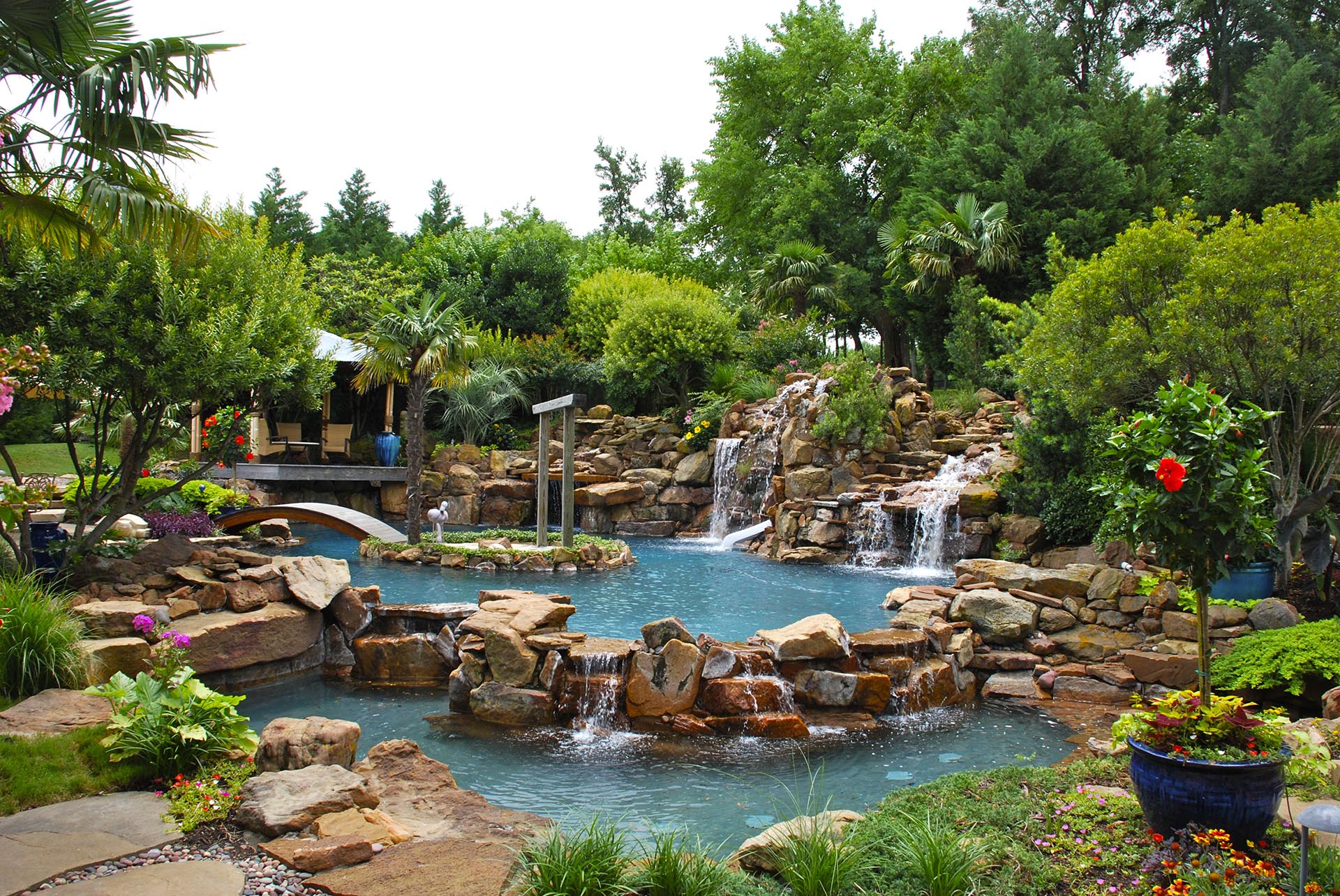 Bali tropical resort style pool garden in Dallas by landscape architect