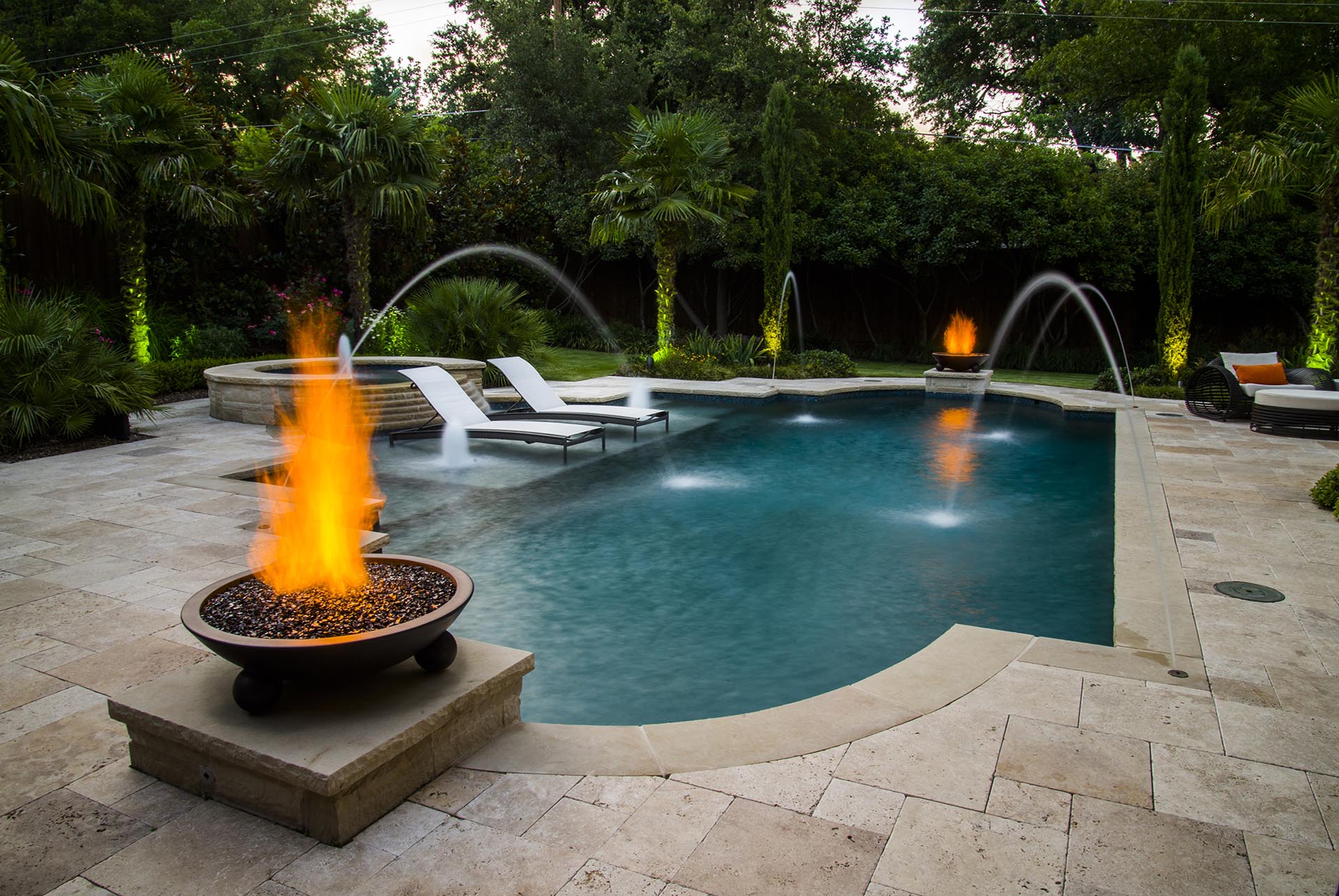 Mediterranean pool retreat with fire feature in Dallas by pool designer