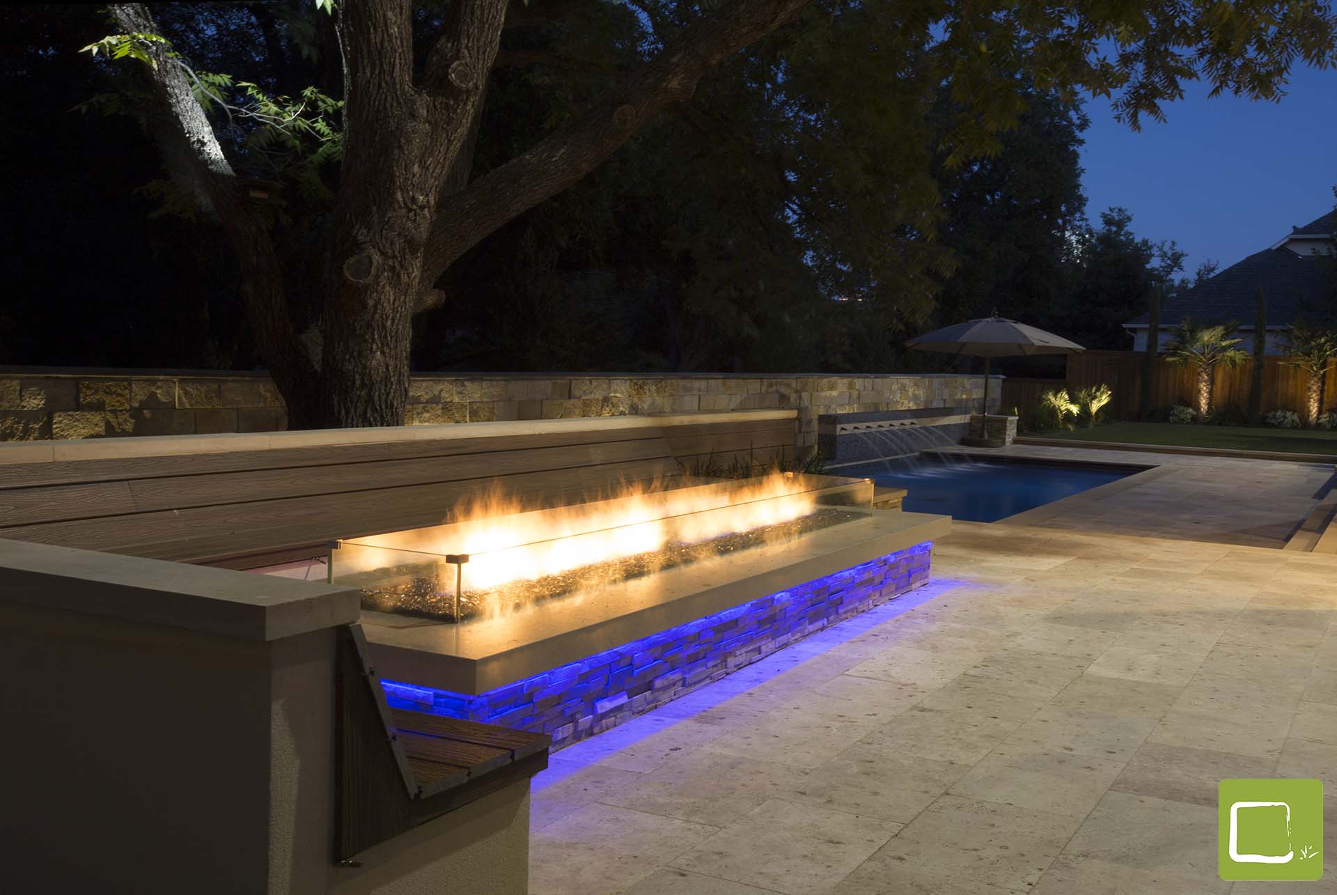 Modern Cantera pool with fire pit outdoor living in Dallas by landscape architect