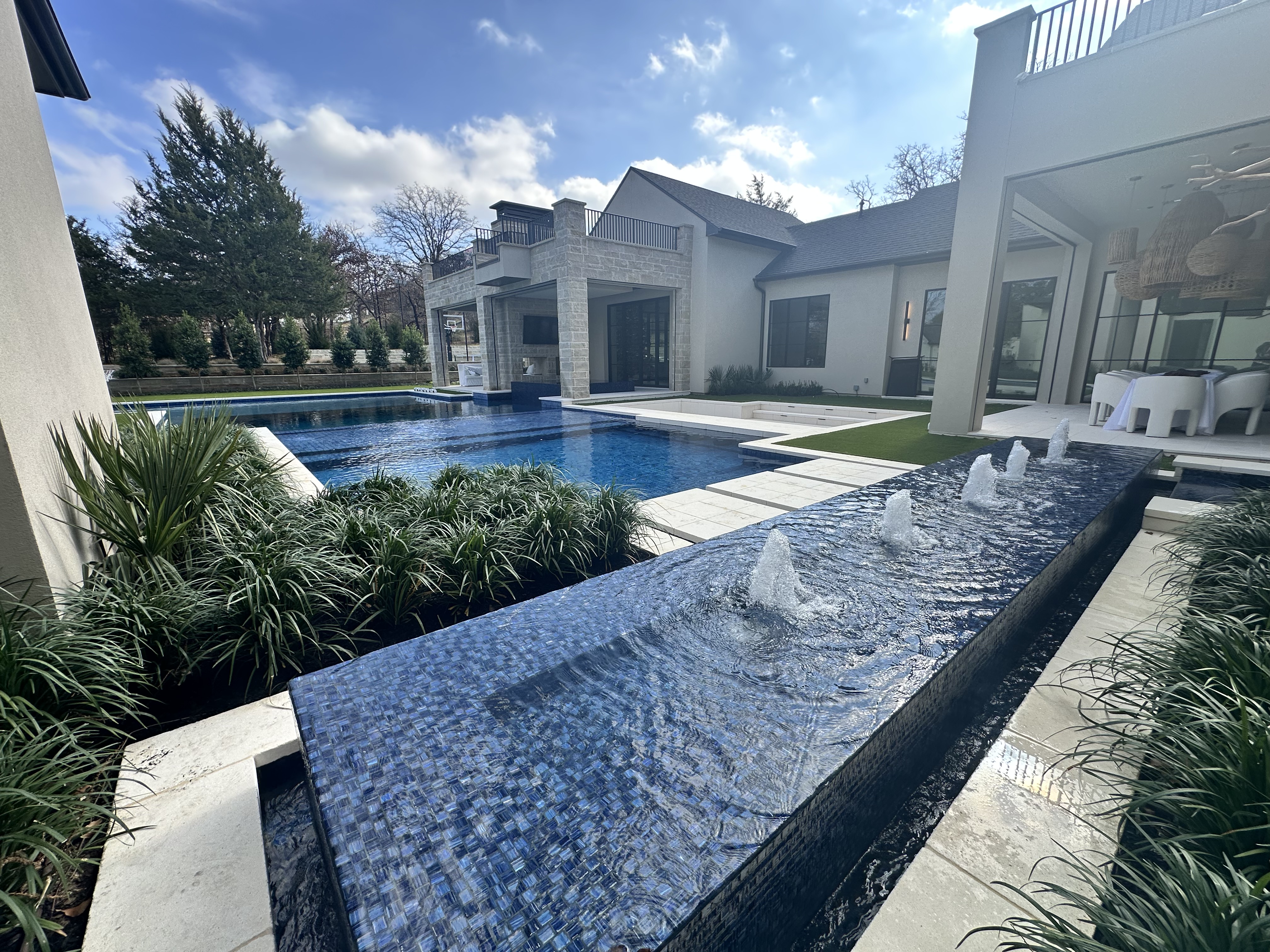 Modern estate pool landscape design in Keller Texas by Dallas landscape architect